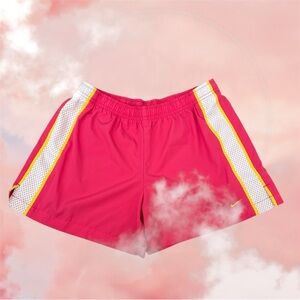 NIKE shorts pink, yellow, and white 
Size 4-6